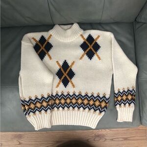 Hand knit, made in Canada
Size medium
Wool acrylic blend. Great condition!